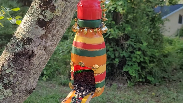 DIY coffee creamer bird feeder