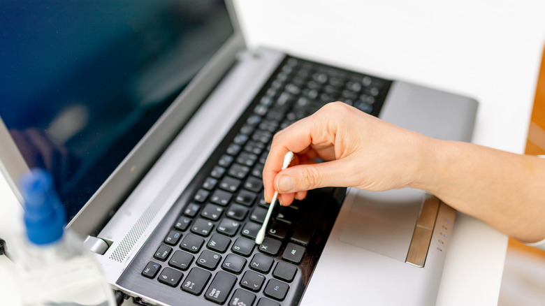 Cleaning computer with a Q-tip