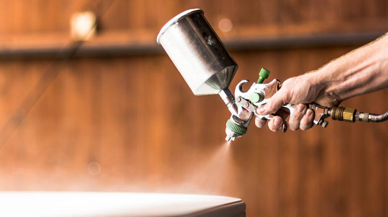 Paint spraying a table white