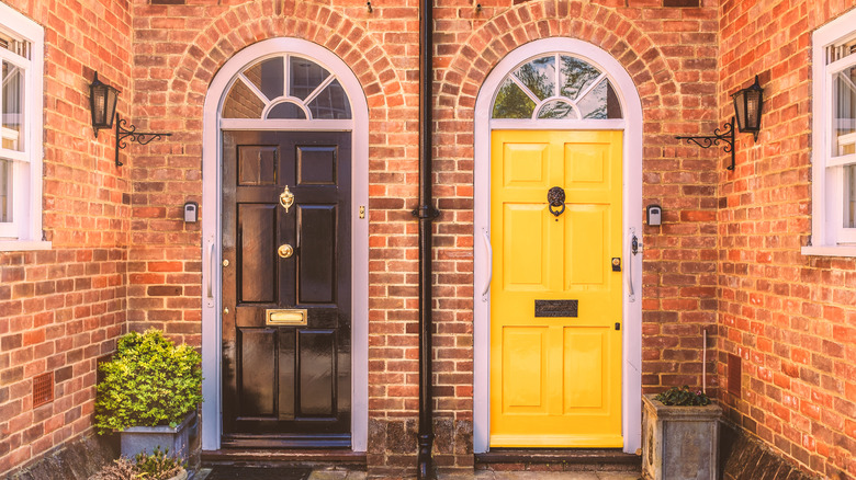 yellow door on red bricks