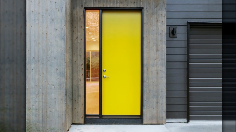 modern home with yellow door