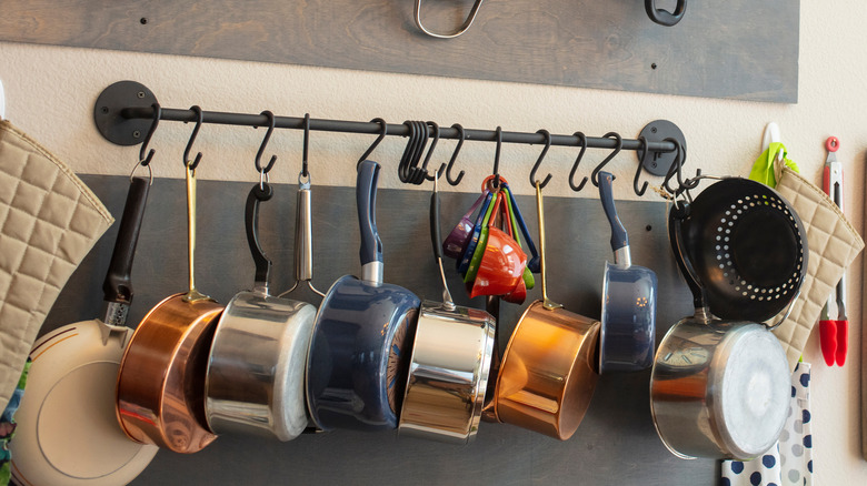 pans hanging on kitchen wall