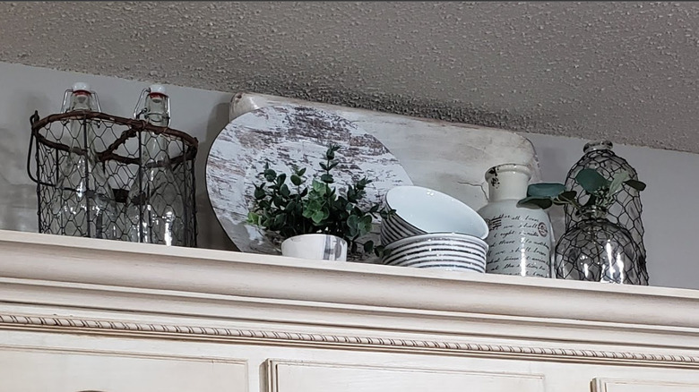 plates on top of cabinets