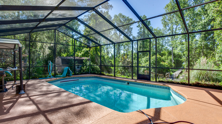 Pool with enclosed glass