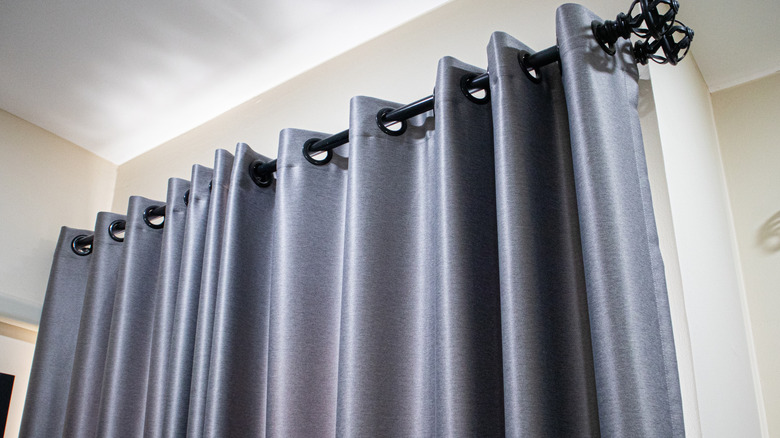 Gray curtain with grommets