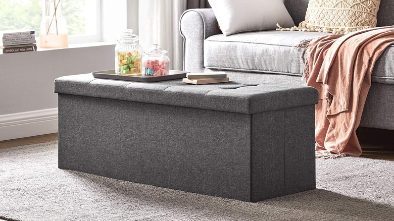 gray ottoman in living room