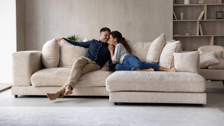 Couple sitting on couch