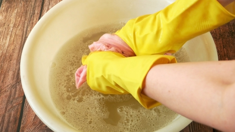 soaking clothes to remove glue