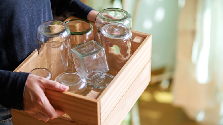 A pair of mason jars filled with a white cream