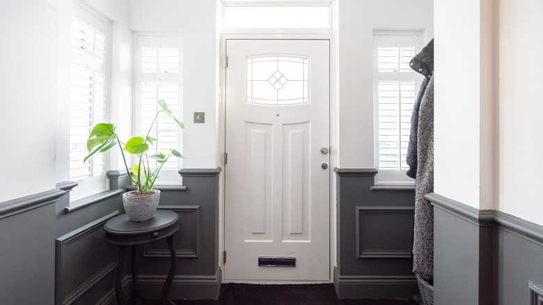 Open entryway to a home without a mudroom