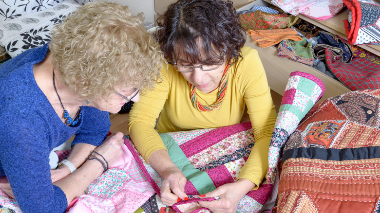 women quilting