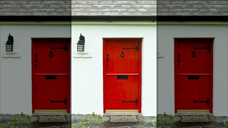 Letter plate on red door