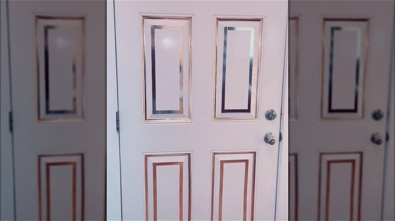 Door with aluminum foil tape inlay