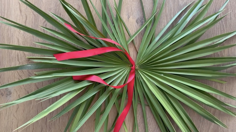 Palm Leaves wrapped in ribbon.