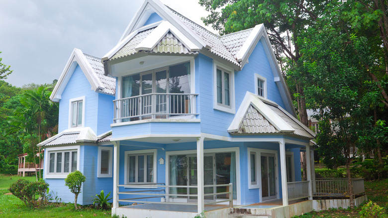 Bright blue Victorian house