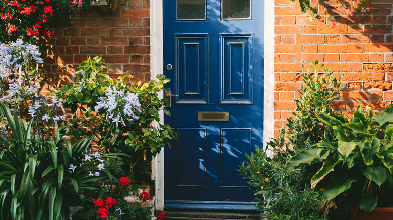 Brick home dark blue door