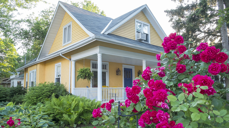 Yellow and white house exterior