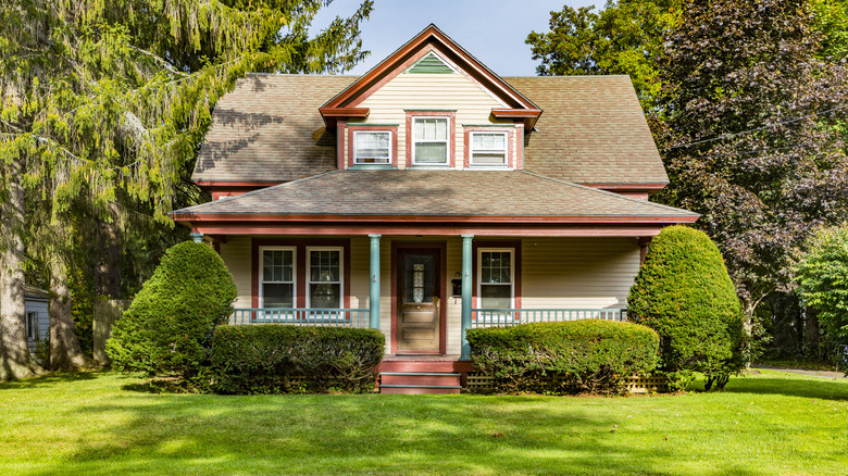 Craftsman home teal columns