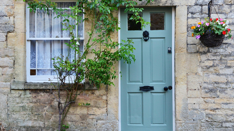 Cottage stone blue front door