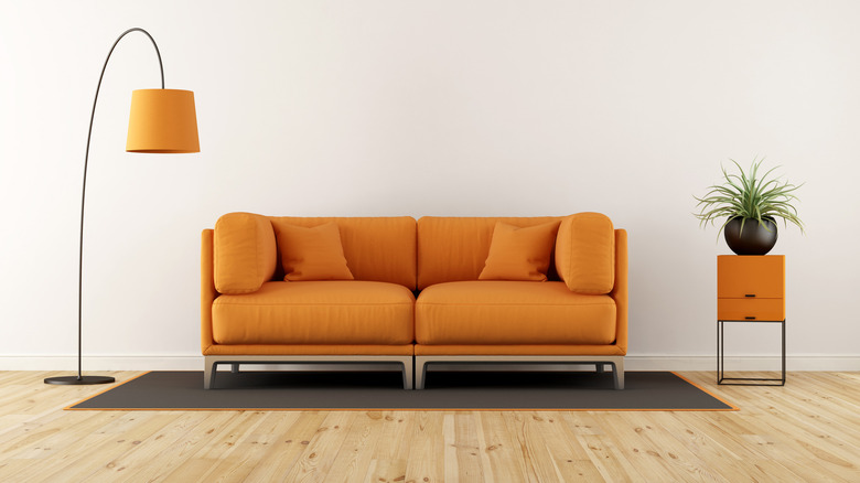 orange couch in a room