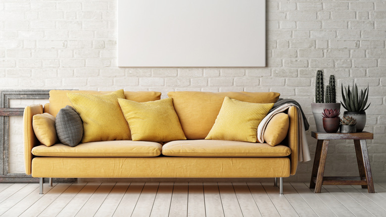 yellow couch in a room