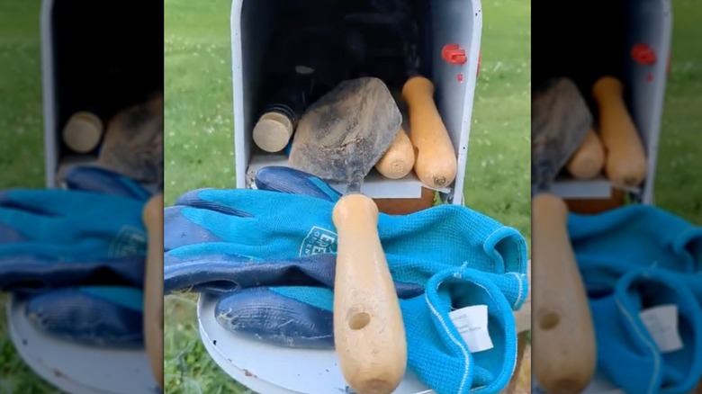 garden tools in mailbox