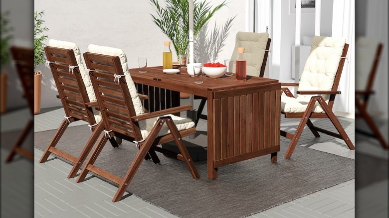 Wood patio furniture with drinks