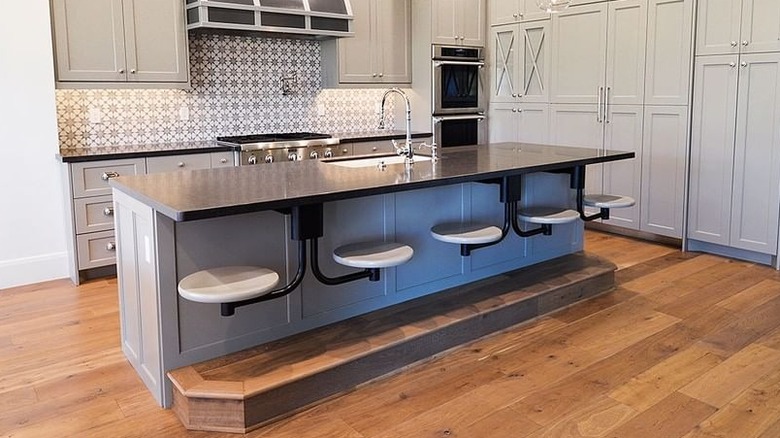 HGTV's Karen E Laine Uses Swing-Out Stools For Seating In Her Small Kitchen