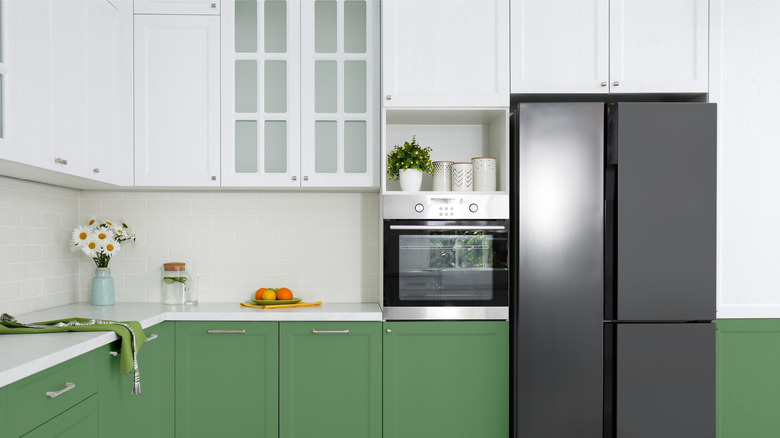 kitchen with white upper cabinets