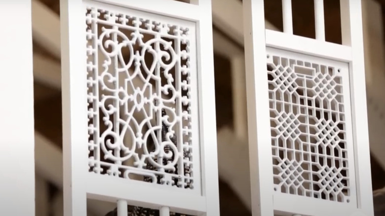 white iron grate railings