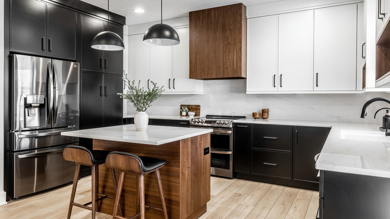 Black and white cabinets in kitchen