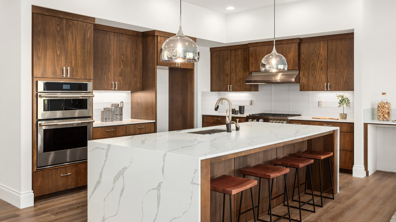 Dark wood cabinets in kitchen