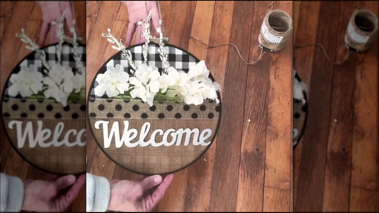 Welcome sign in an embroidery hoop