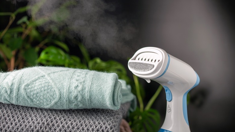 Clothes steamer giving off steam