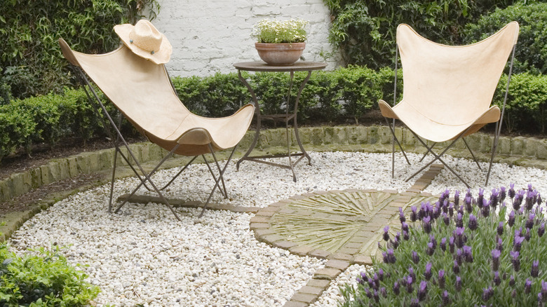 Gravel seating area in front yard