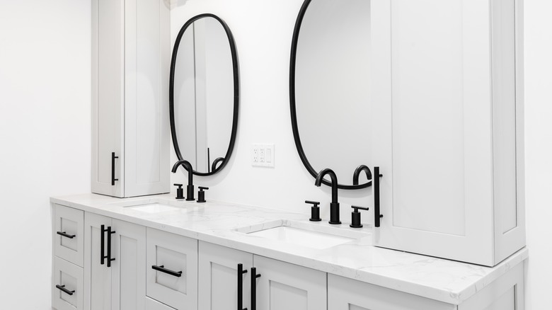 Gray bathroom with dark fixtures