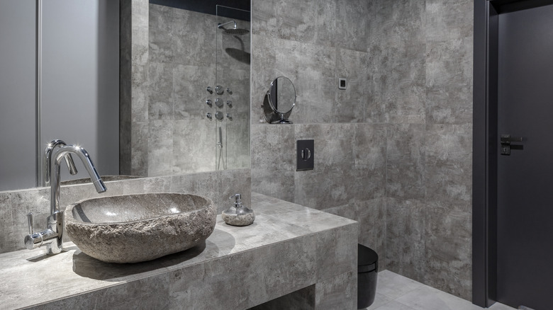 Gray bathroom with boulder sink