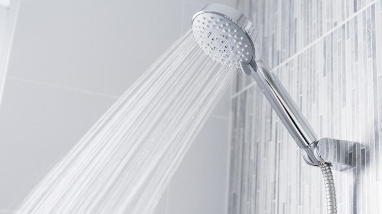 wall showerhead with running water