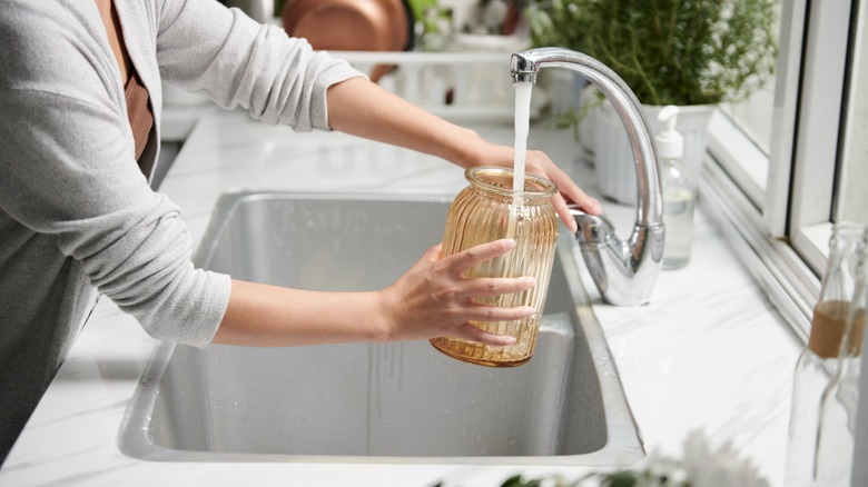 Filling vase with tap water