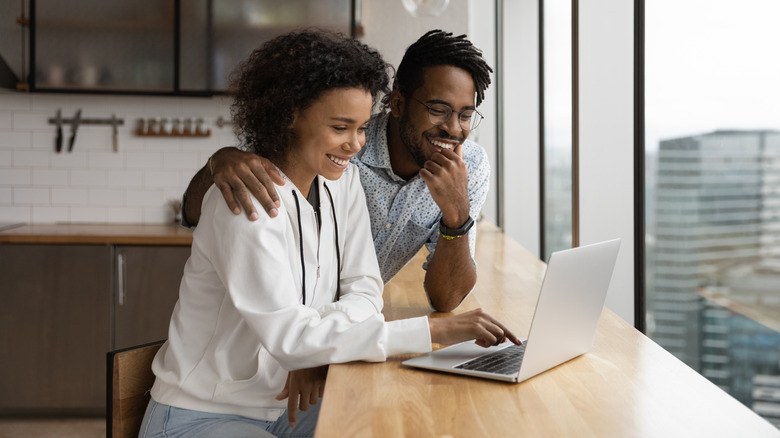 Couple looking at computer