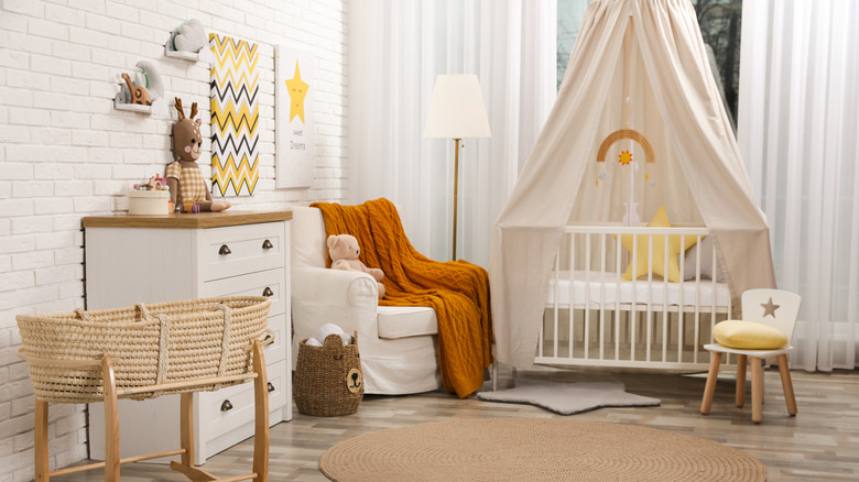 yellow and white baby room