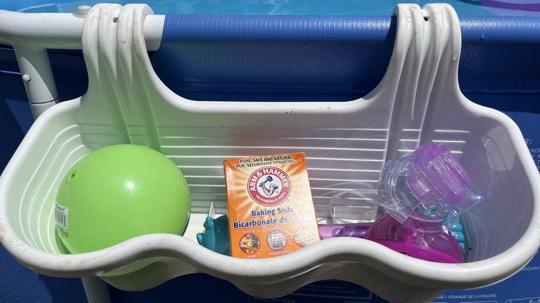 Pool toys with baking soda box