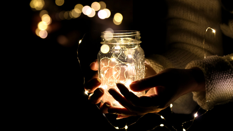 Mason jar with fairy lights night