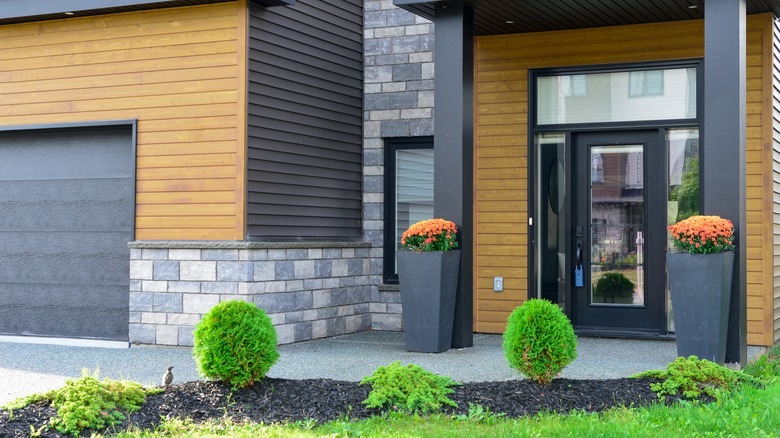 Street view of a modern executive-style suburban house.