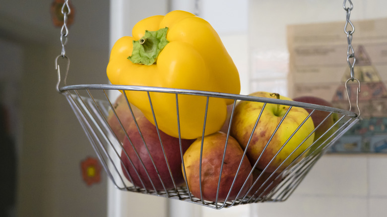 Fruit displayed in one tier of a wire hanging basket