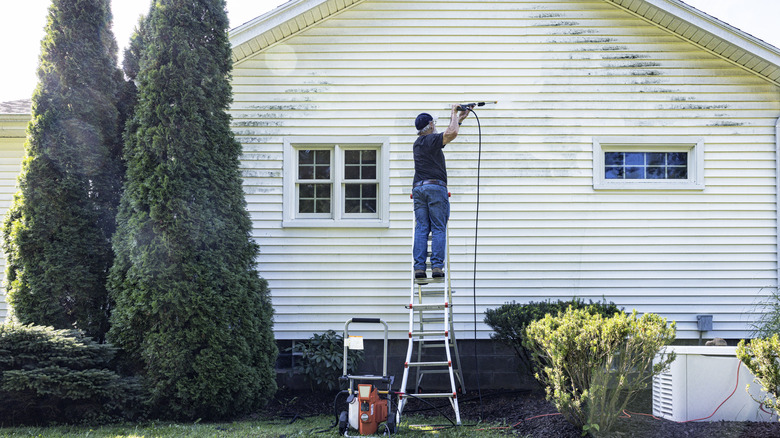 Pressure washing house