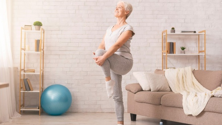 Woman doing yoga stretches