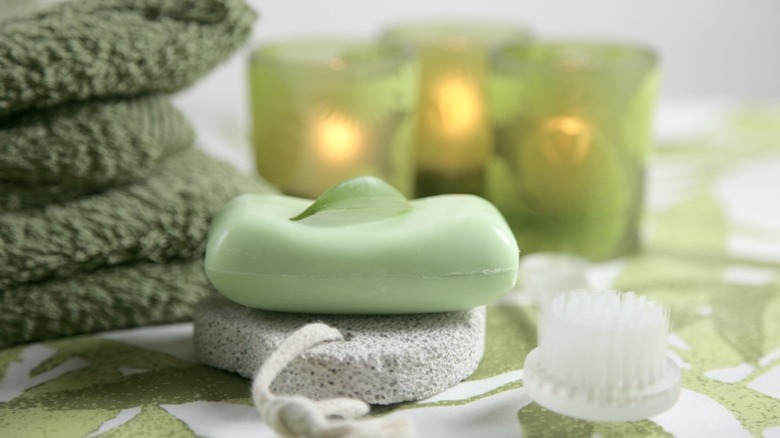 Candles and towels in bathroom 