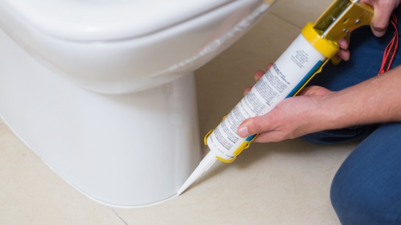 Caulking around bathroom toilet 