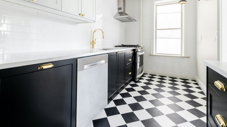 Modern kitchen with black and white checkered floor